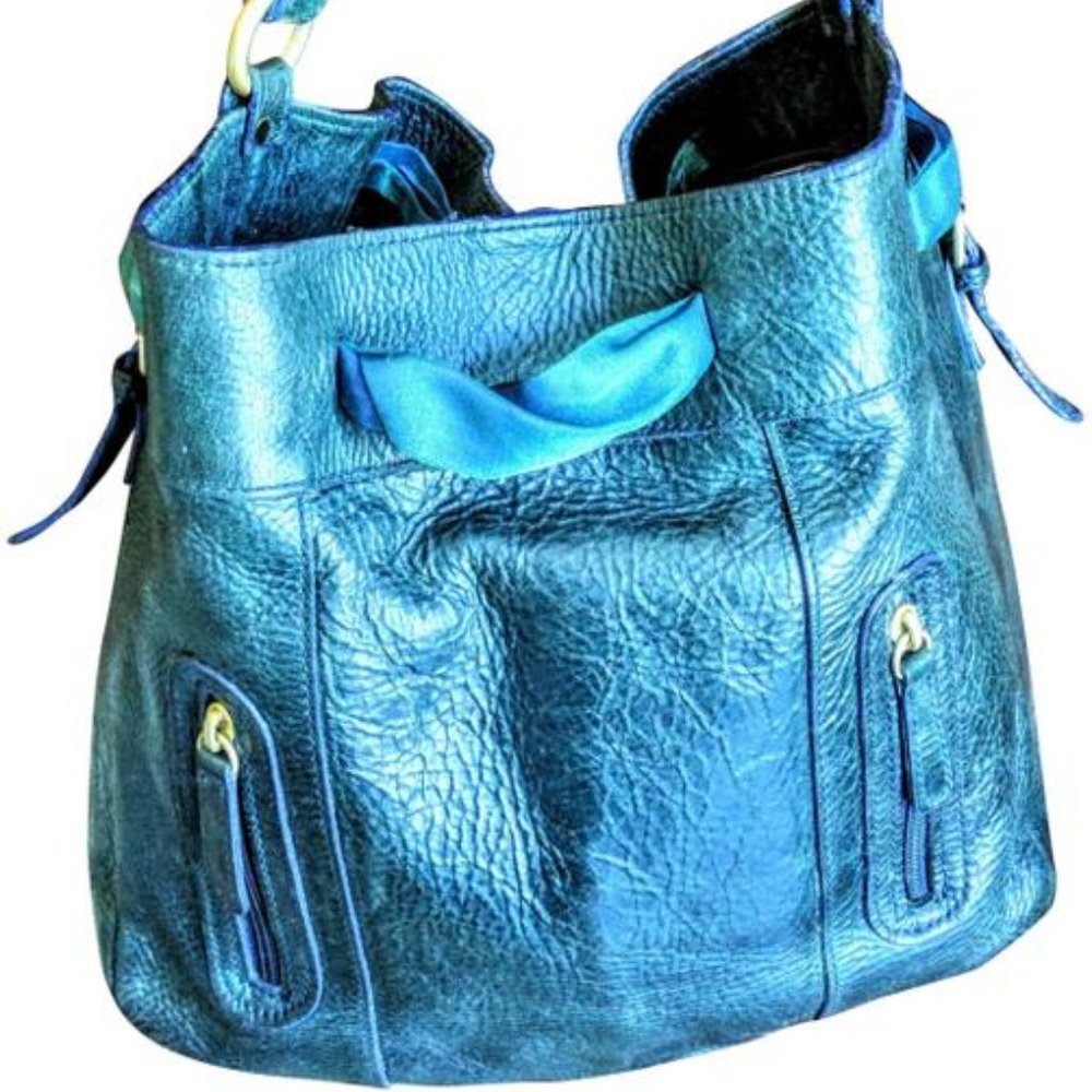 - Deep teal leather purse
